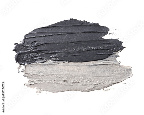 Smear of cosmetic black and blue clay isolated on a white background