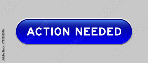 Blue color capsule shape button with word action needed on gray background
