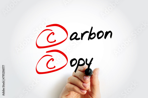 CC - Carbon Copy is a copy of a note sent to an addressee other than the main addressee, acronym text concept with marker photo