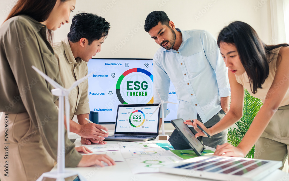Fototapeta premium diversity team brainstorming focused on ESG (environment,social,governance) for sdgs goals in a sustainable green office