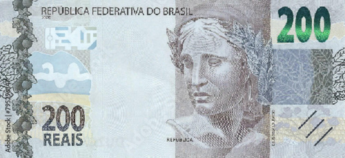 Vector obverse high polygonal pixel mosaic banknote of Brazil. Front side. Denominations of bill 200 reals. Game indian money of flyer. photo