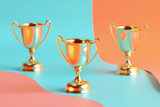 Gold trophies on a color background, to represent success