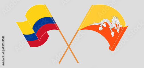 Crossed and waving flags of Colombia and Bhutan