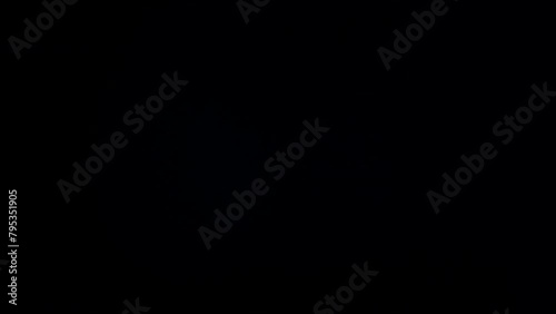 Blue light defocused reflections screen overlay on a black background