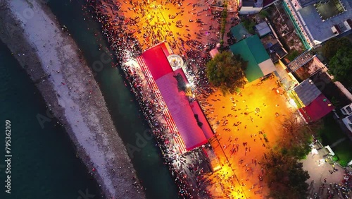 upper view of people gathered on triveni ghat drone shot photo