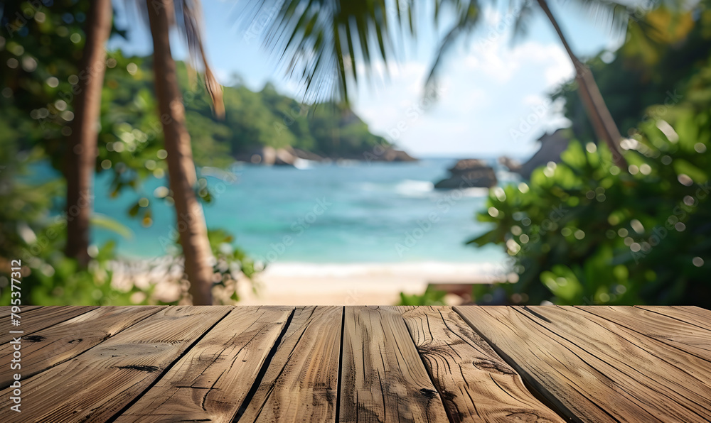 Blurred tropical beach landscape on wooden table top for product display or montage. Blurred tropical beach landscape on wooden table top for product display or montage.
