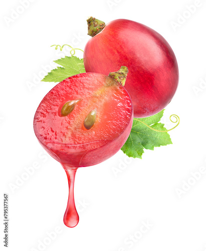 Red grape juice dripping from cut in half isolated on white background.