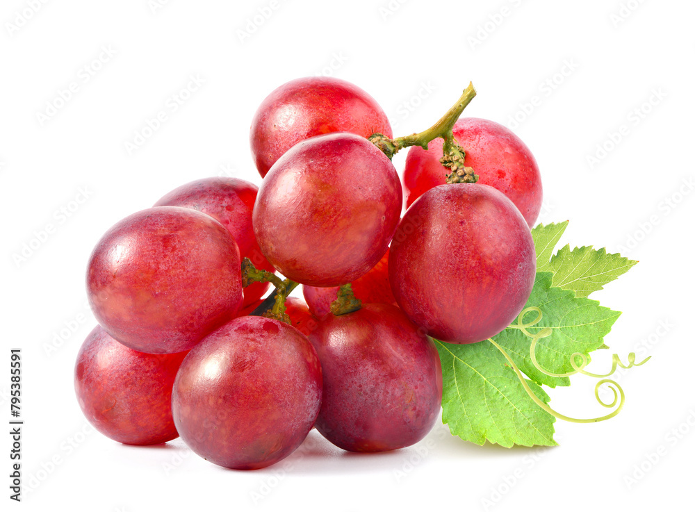 Red grape cluster with leaves isolated on white background.