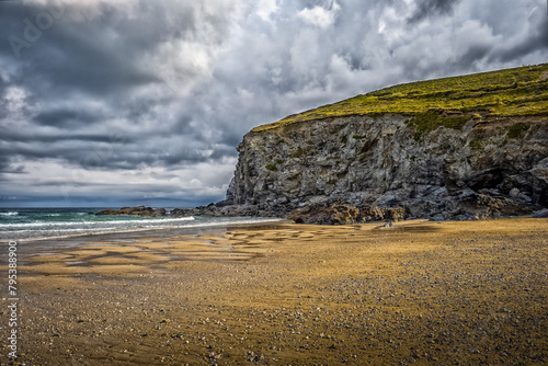 Porthtowan Beach - Sandy Beach and Cliff Under Cloudy Sky photo