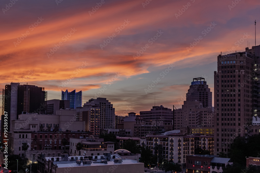 Downtown San Antonio Texas city skyline buildings and skyscrapers. Photo taken in the evening during a dramatic pink sunset