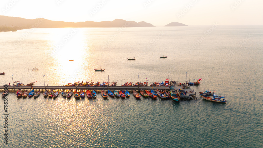 Top view or aerial view of Bridge with long-tail boats and beautiful sunset light