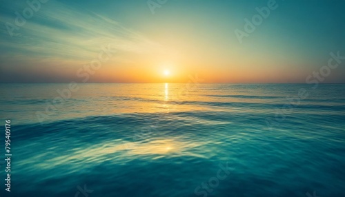 beautiful closeup sea water surface sunset sunrise gold blue colors calm soft waves relaxing horizon dream fantasy shallow focus blur seascape sky tranquil peaceful nature pattern mediterranean