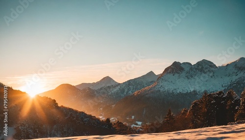 mountain range at sunset low angle winter golden hour lighting peaceful