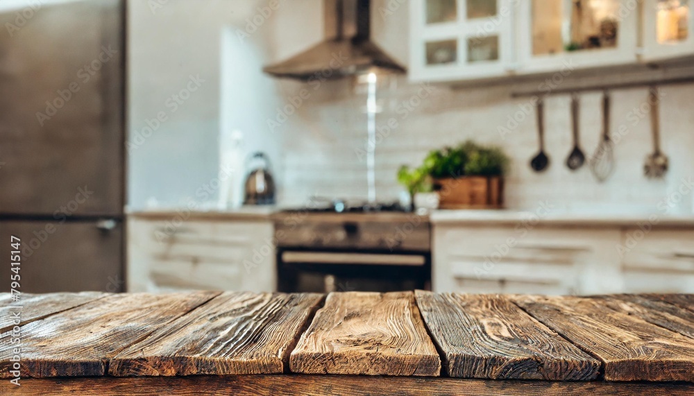 empty old wooden table with kitchen in background