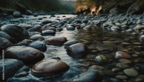 smooth river pebbles arranged in a shallow stream with water gently flowing over them creating a soothing and serene ambiance
