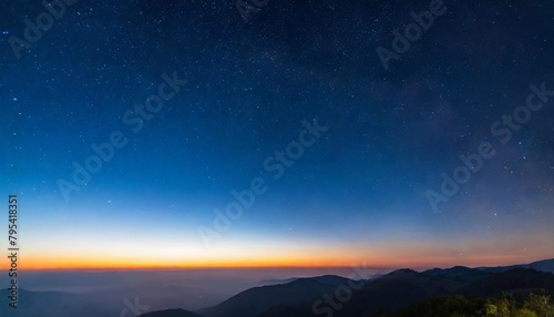 a beautiful dawn of the sun with stars gradient from blue to red