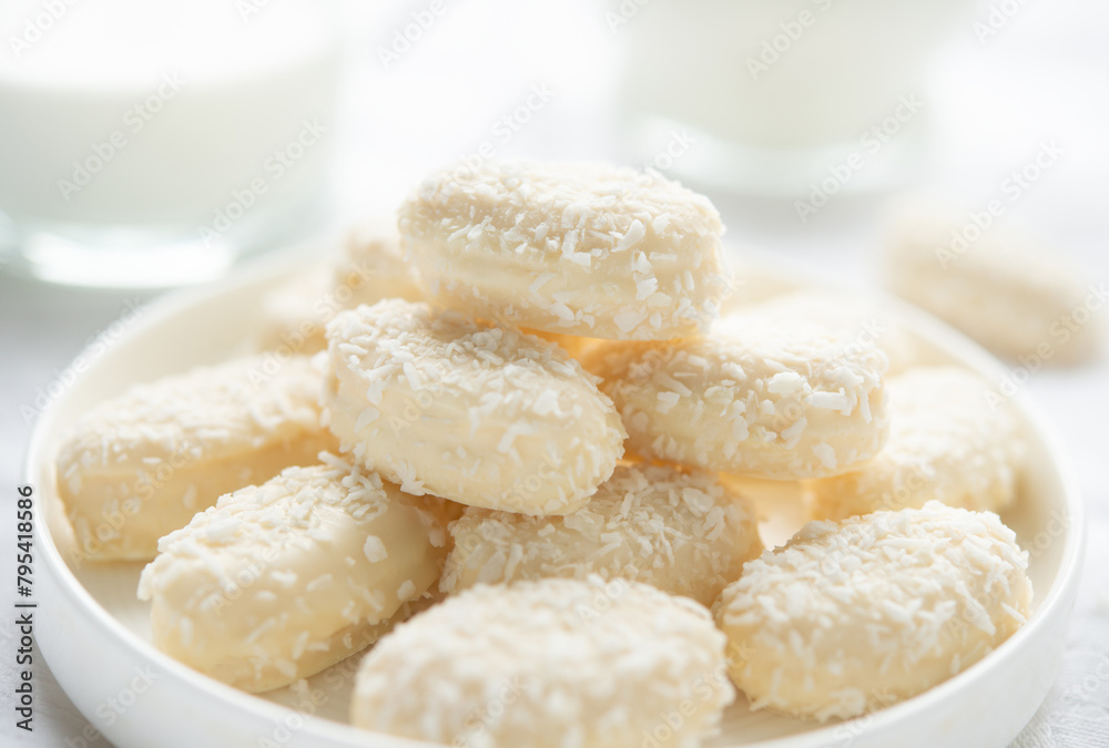 Homemade coconut candies in a plate. Homemade coconut candies in a plate.