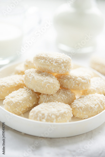 Homemade coconut candies in a plate.