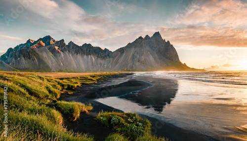 majestic summer scene of stokksnes headland with vestrahorn batman mountain on background unbelievable evening view of iceland europe beauty of nature concept background photo