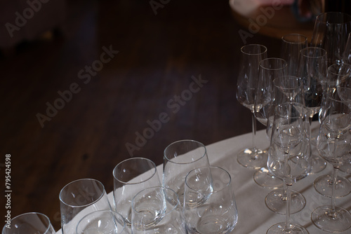Glass glasses at an event. Catering and table setting for weddings and birthdays