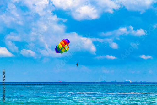 Paragliding with boat in the Caribbean in Mexico.