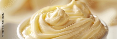 Indulge in the creamy smoothness of liquid mayonnaise, its gentle flavor and pale color evoking a sense of serenity