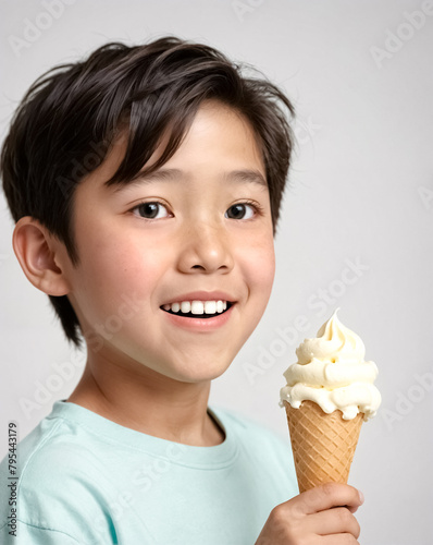 boy holding a ice cream in hand