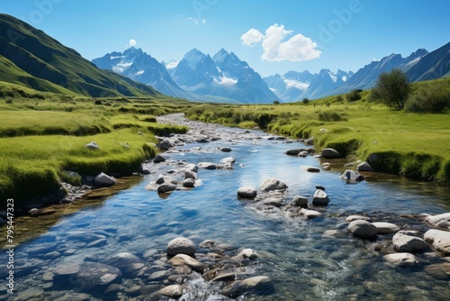 b'Mountain river flowing through a valley on a sunny day'