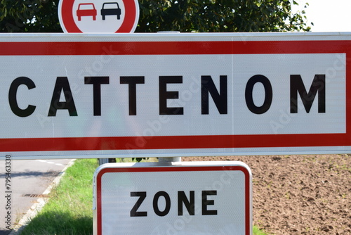town sign of Cattenom, no overtaking, speed limit 30 photo