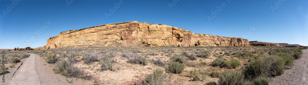 Chaco Culture National Historical Park in New Mexico. Chaco Canyon was a major Ancestral Puebloan culture center with many pueblos. Northern canyon wall, Pueblo Bonito, Chetro Ketl. Chaco Culture National Historical Park in New Mexico. Chaco Canyon was a major Ancestral Puebloan culture center with many pueblos. Northern canyon wall, Pueblo Bonito, Chetro Ketl.