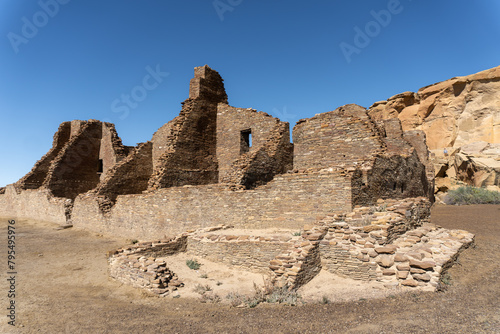 Pueblo Bonito, the largest and best-known great house in Chaco Culture National Historical Park in New Mexico. Chaco Canyon was a major Ancestral Puebloan culture center. Threatening Rock, great kiva. photo