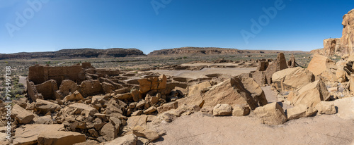 Pueblo Bonito, the largest and best-known great house in Chaco Culture National Historical Park in New Mexico. Chaco Canyon was a major Ancestral Puebloan culture center. Threatening Rock, great kiva.