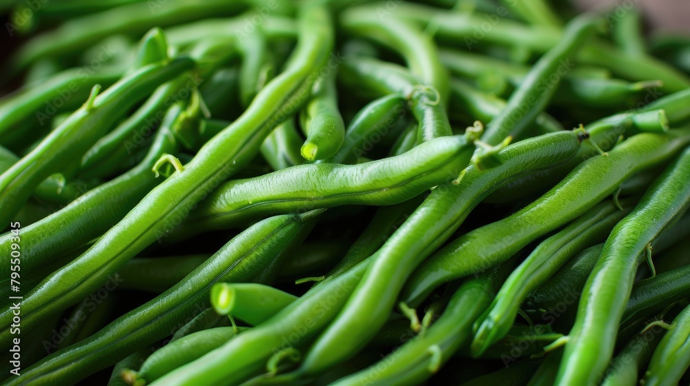 Green beans on the counter in the market. Selective focus. Green beans on the counter in the market. Selective focus.