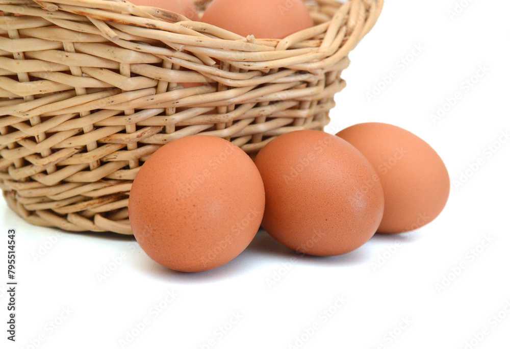 Eggs isolated in basket on white background Eggs isolated in basket on white background