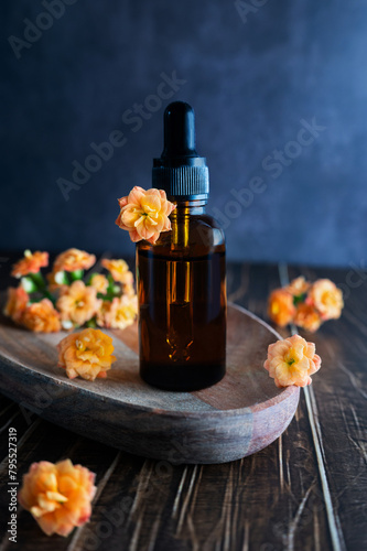 Bottle with facial serum or aroma oil, skin care.