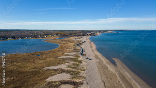 Aerial Drone View Of A Beautiful Beach and Boardwalk On The Coast Of The Atlantic Ocean in Bouctouche  New Brunswick  Canada