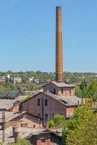 Tall Bricks Chimney at Abandoned Sugar Factory Old Industrial Complex