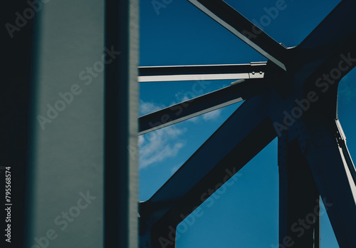 Canvastavla A fragment of the steel structure of the railroad bridge against the sky