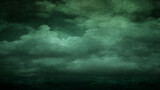 A dark, cloudy sky with a storm brewing. The sky is filled with dark, stormy clouds and the atmosphere is tense and foreboding