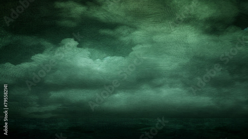 A dark, cloudy sky with a storm brewing. The sky is filled with dark, stormy clouds and the atmosphere is tense and foreboding