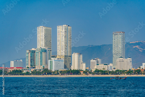 The city is from a distance from the sea. Nha Trang city in Vietnam. View of the city from the sea. © MASTERVIDEOSHAR
