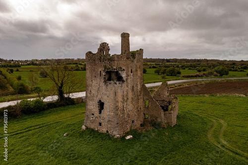 Wide-angle shot of Srah Castle. Dramatic clouds enhance the scene. Tullamore, Ireland photo