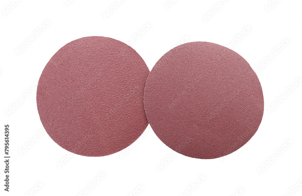 Two coarse sandpaper disks isolated on white, top view Two coarse sandpaper disks isolated on white, top view