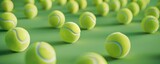 Multiple tennis balls on green surface with one in focus. Repetition and sports gear concept for design