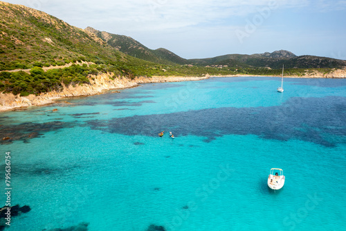 Crystal-clear turquoise waters on Sardinian coast, Tuerredda beach photo