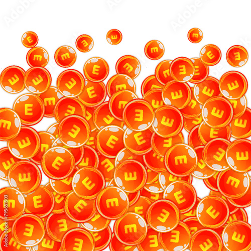 Vitamin E round capsules scattered randomly.