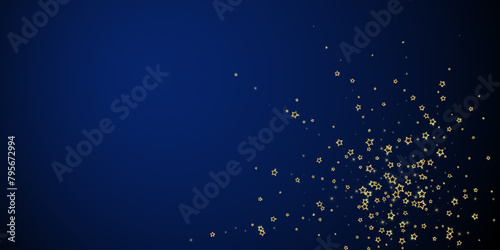Gold sparkling star confetti. photo