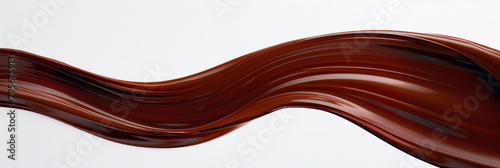 A wave of rich mahogany brown paint glides smoothly across the pristine white background photo