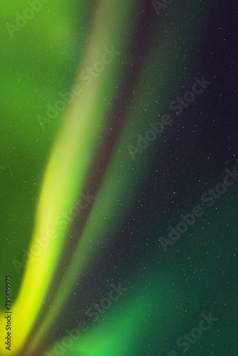 Green aurora borealis. Northern lights and dark night starry sky photo