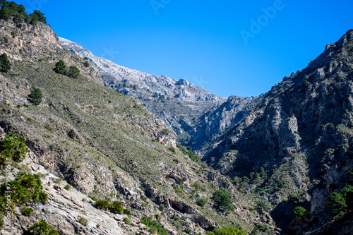 Hiking trail to Colgante bridge (Puente Colgante El Saltillo) over Almanchares river, Sierra Tejeda, Andalusia, Spain